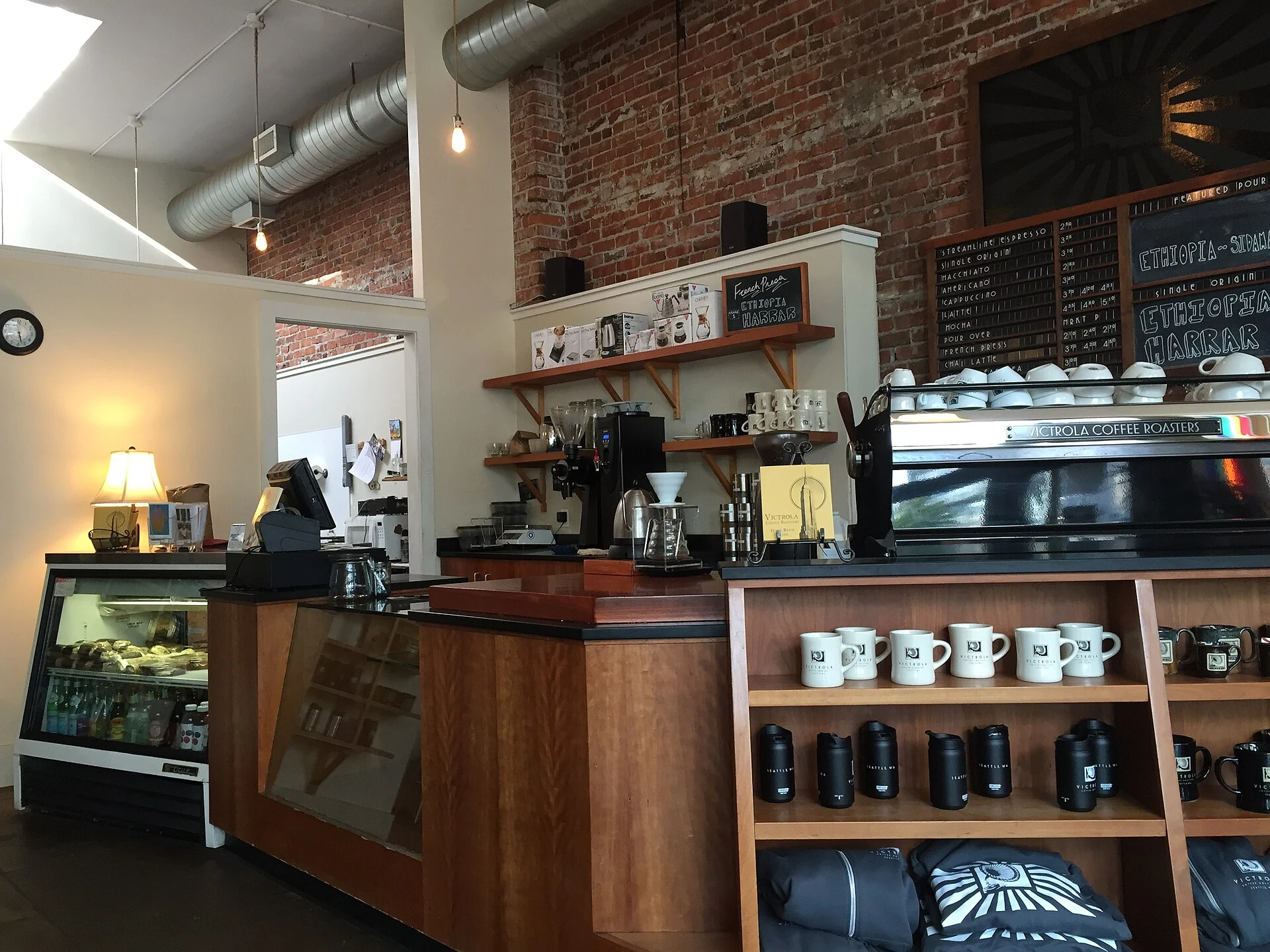 Warm wooden espresso bar inside a neighborhood café